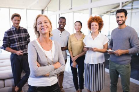 Portrait of smiling colleagues in office