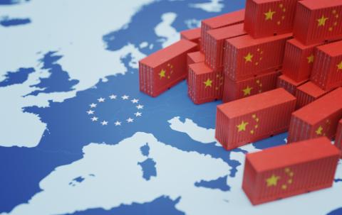 Chinese cargo containers on map of Europe. Import of chenese goods concept. 3D rendered illustration.
