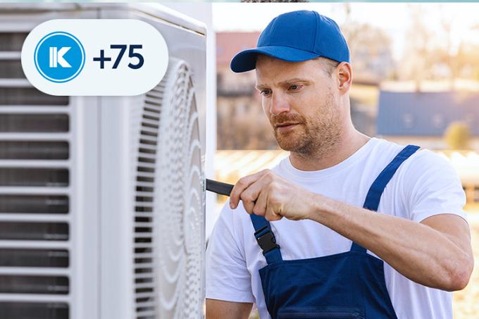 Technician installs a heat pump